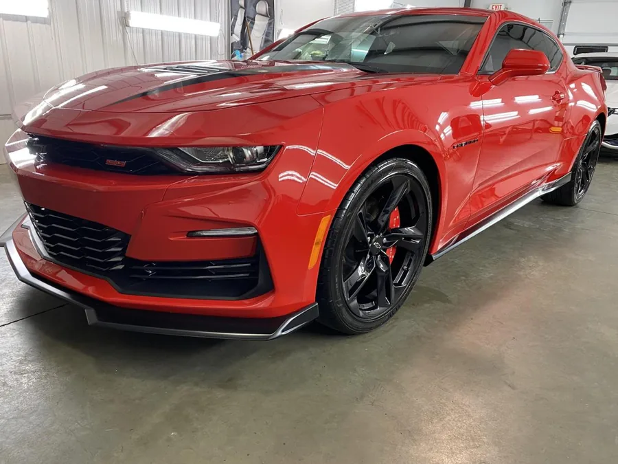 Coated red Camaro with a mirror finish